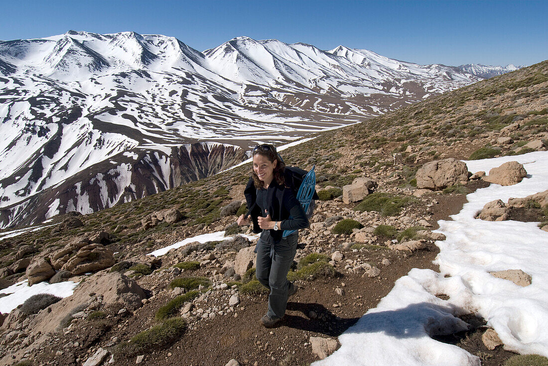 Morocco, High Atlas, hiker at  M'Goun massif, snow