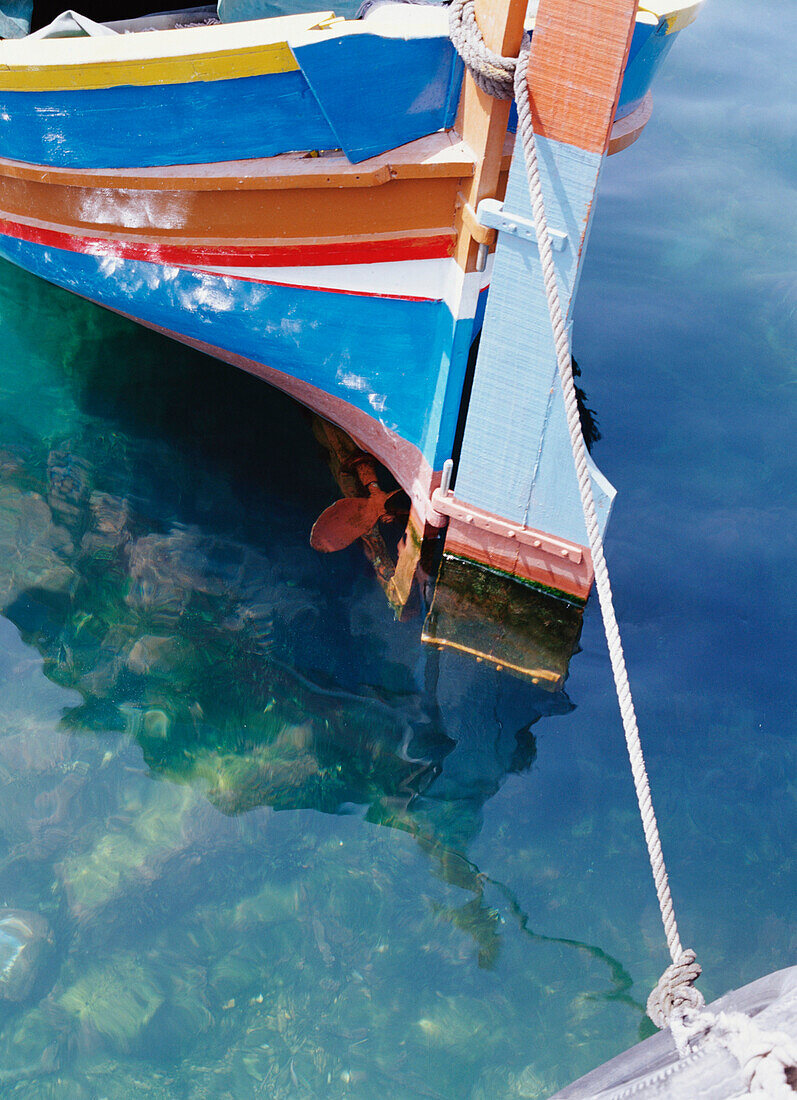 Colorful painted boat in harbor in Malta, close-up, Gozo, Malta