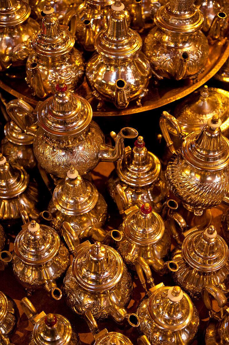 Brass tea pots on display in the souks of Marrakesh, Marrakesh, Morocco