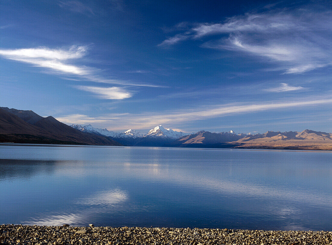 Looking across Lake Pukaki at dusk to Mount Cook and Southern Alps, South Island, New Zealand