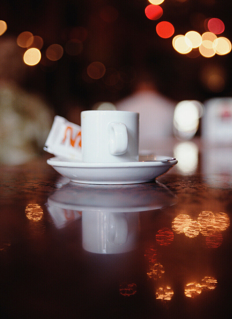 Coffee cup and saucer on a table in a cafe, Lisbon, Bairro Alto, Lisbon, Portugal