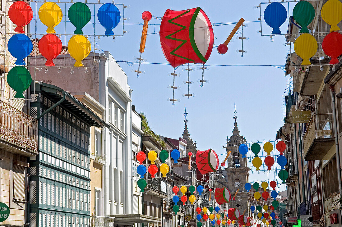 Colorful banners hanging between buildings in Braga, Douro Valley, Portugal