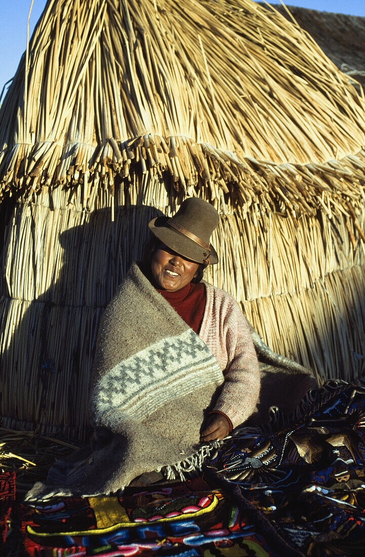 Handicraft seller, Uros Islands, Lake Titicaca, Peru