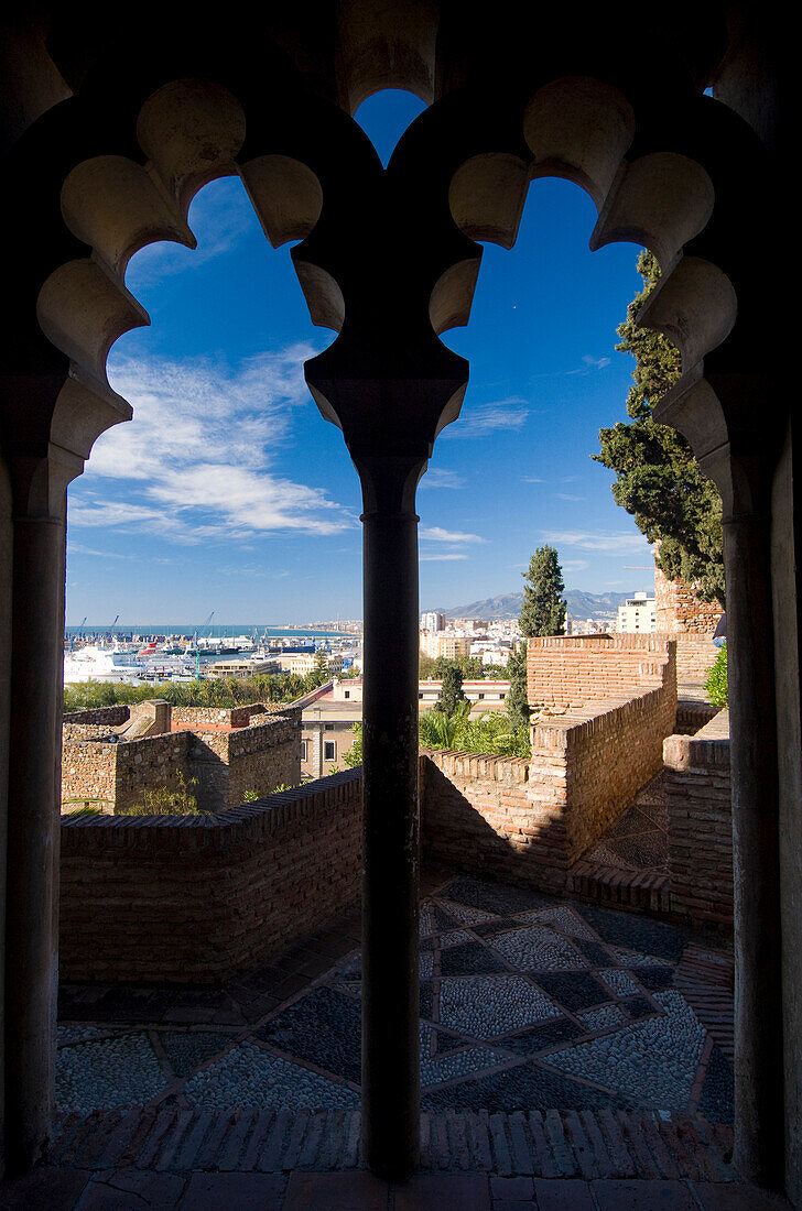 Looking out from arched window of Alcazaba, Malaga, Andalucia, Spain