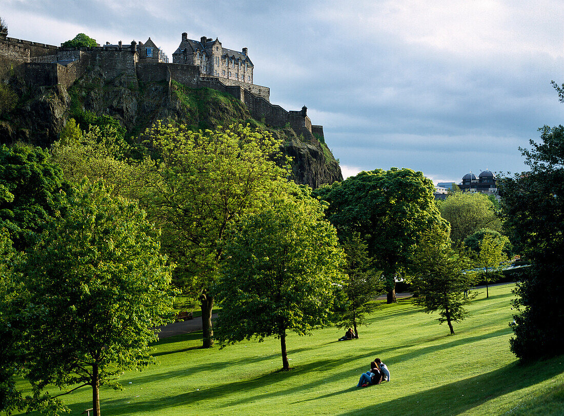 Couple in park, Edinburgh Castle, Scotland, UK