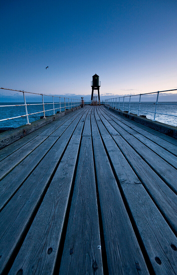 Pier at dawn, Whitby, North Yorkshire, England.