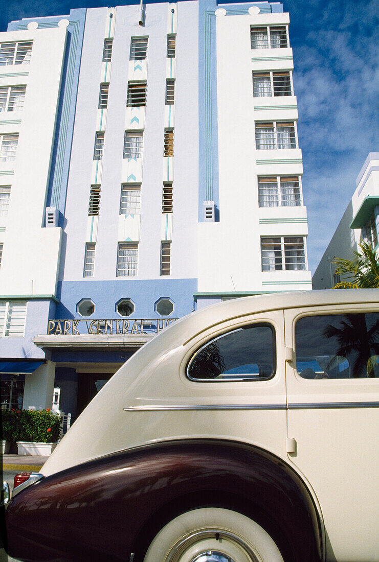 Old White car, art deco building, Miami, Florida, USA  