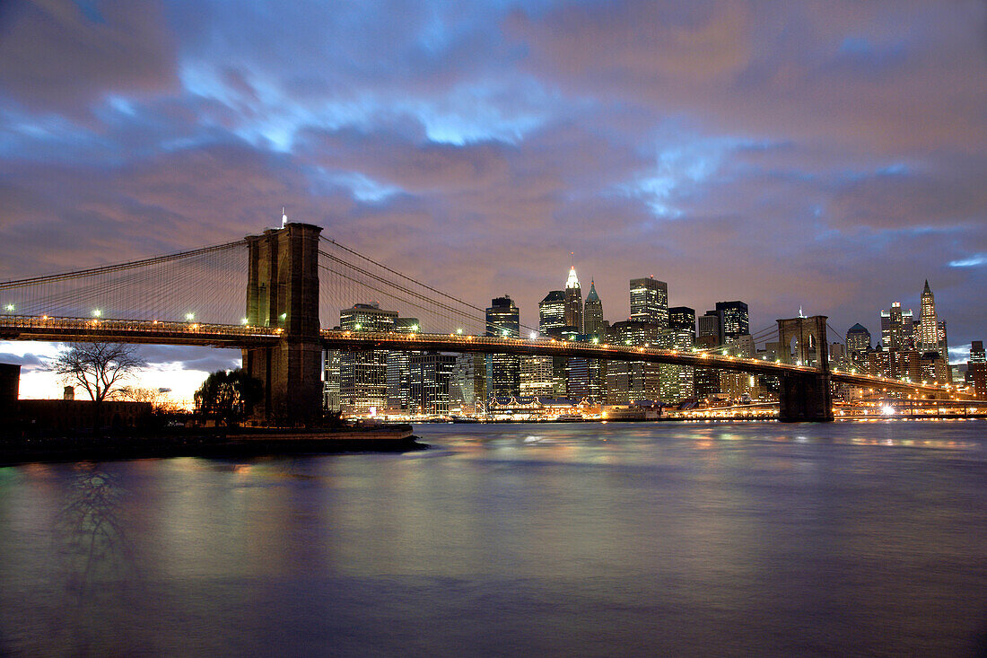 Brooklyn Bridge and Lower Manhattan at dusk, New York City, USA