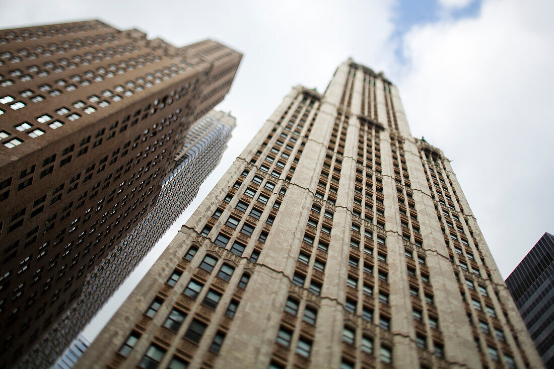 Tilt shift lens image - looking up at Skyscrapers in Manhattan, Manhattan, New York. USA.