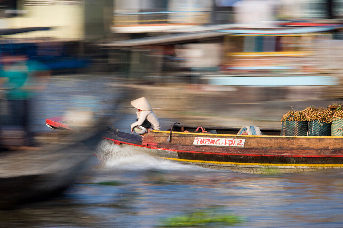 Speeding boat in Mekong Delta, blurred motion, Vinh Long, Vietnam