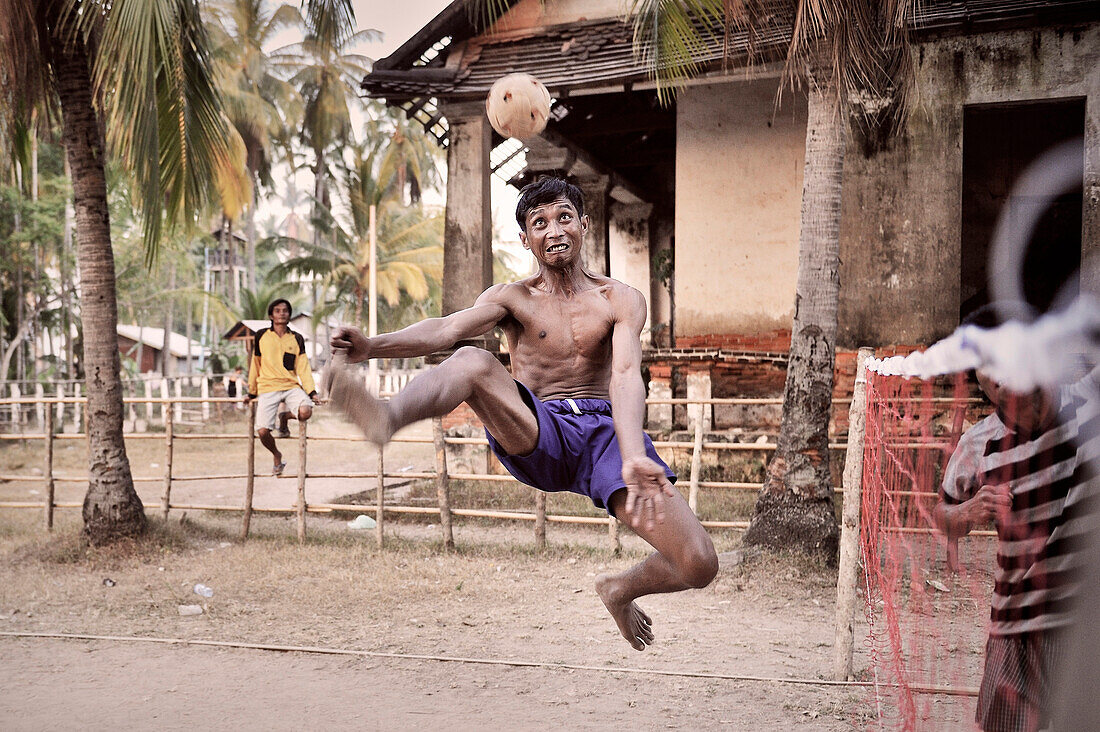 Sepak Takraw, player in action, Don Khon, Si Phan Don - 4000 islands, Mekong, Laos, Sepak Takraw is famous sport in South East Asia