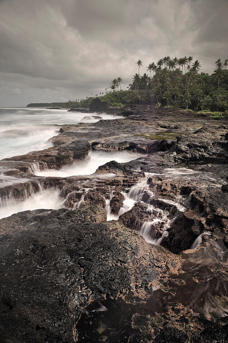 Swell at lava coast around To Sua Ocean Trench, Lotofaga, Upolu, Samoa, Southern Pacific Island, long time exposure