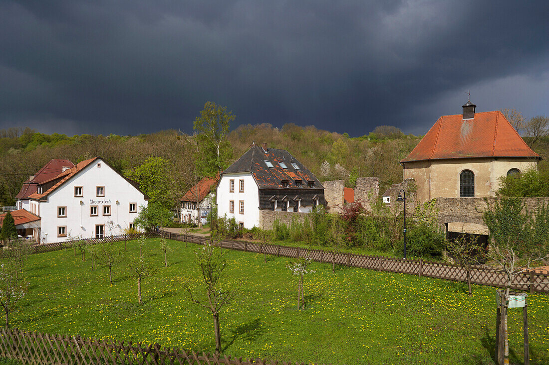 Graefinthal with rest of former Wilhelmiten monastery under thunder clouds, Mandelbachtal, Bliesgau, Saarland, Germany, Europe