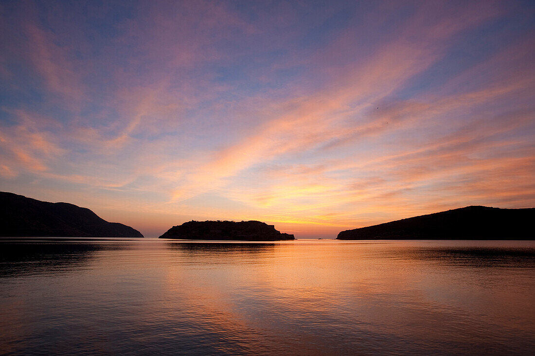 Silhouette of Spinalonga island at dawn, Crete, Greece