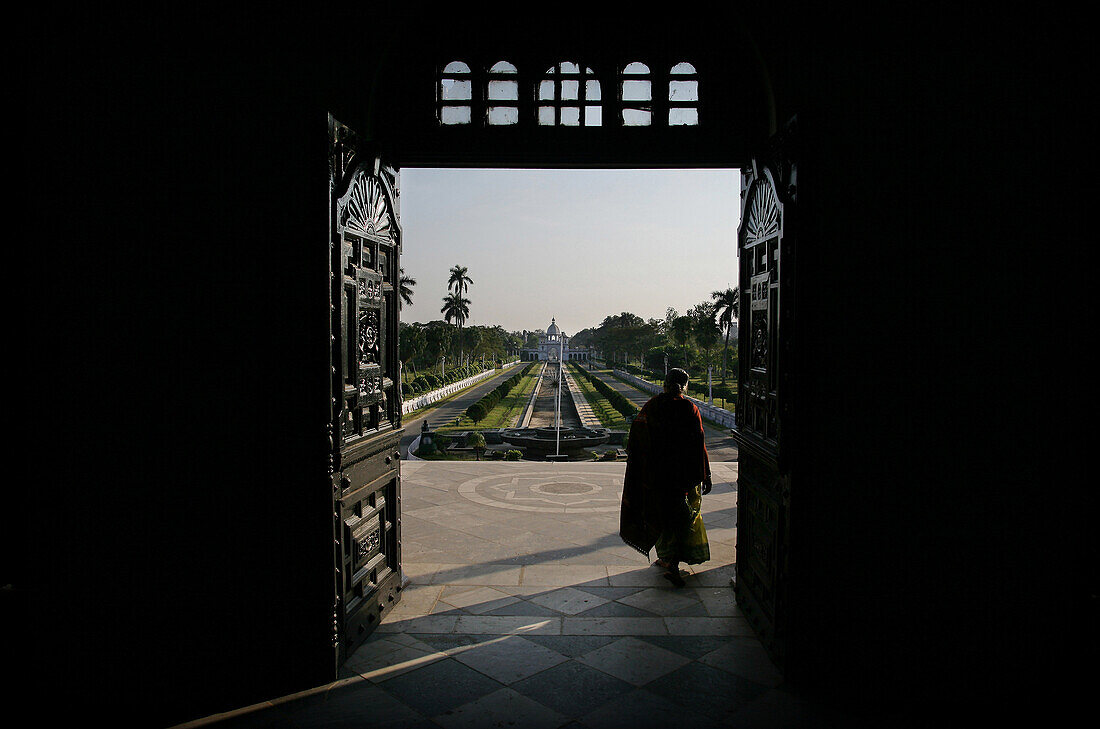 Elderly woman exiting Ujjayanta Palace, Agartala, Tripura, North East States, India