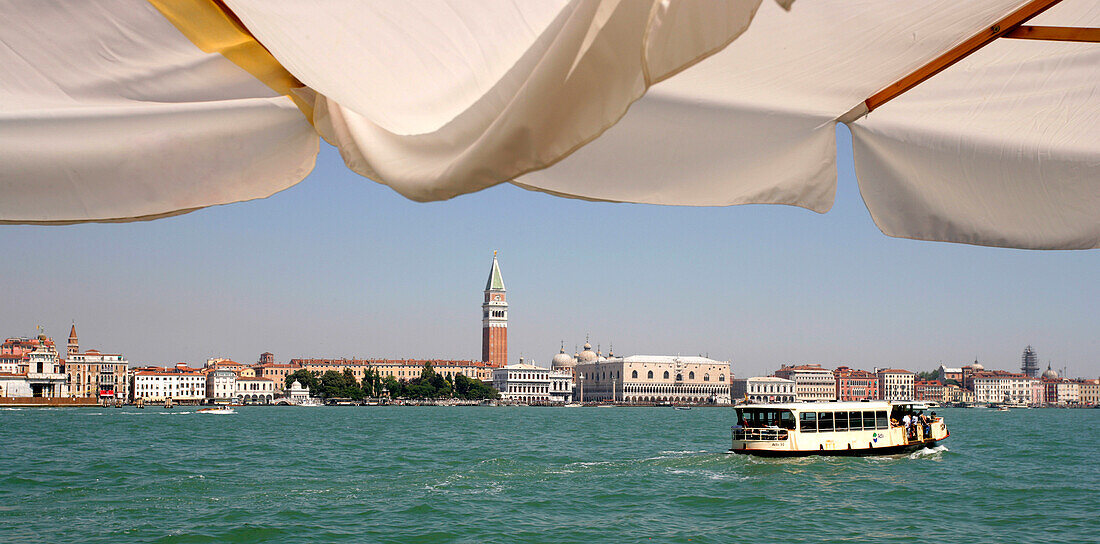 Venice cityscape and cafe umbrellas, Venice, Italy