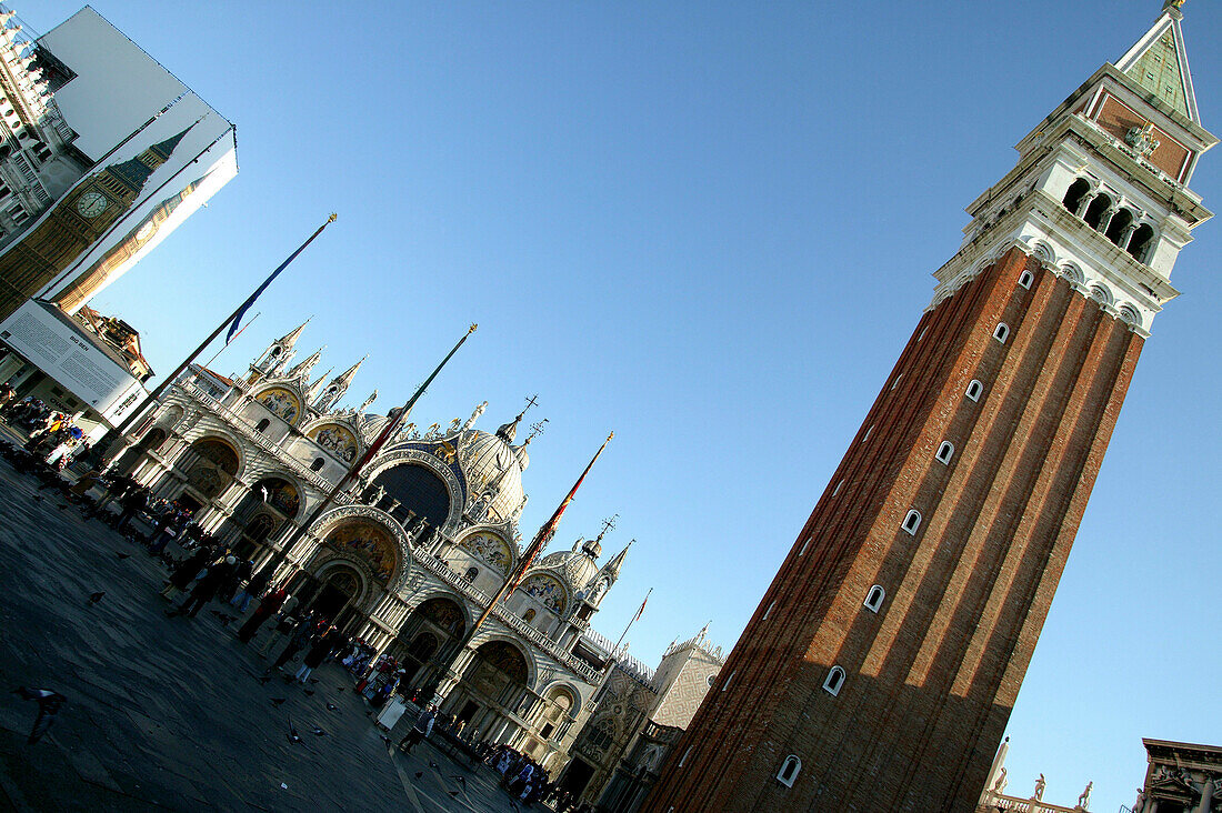 Venice, Italy. The 99m-tall bell tower (Campanile) and the Basilica San Marco on Piazza San Marco