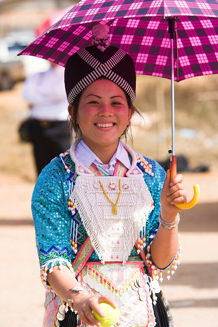 A girl wearing a traditional Hmong costume at the New Year festival, Phonsavan, Laos