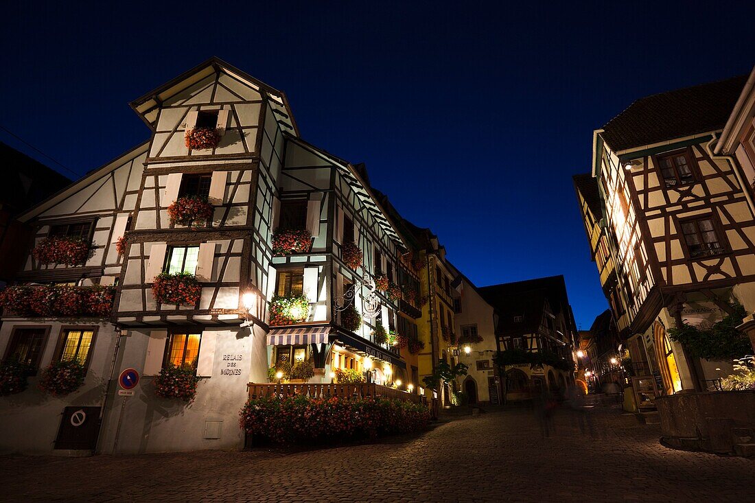 France, Haut-Rhin, Alsace Region, Alasatian Wine Route, Riquewihr, rue du General De Gaulle, evening