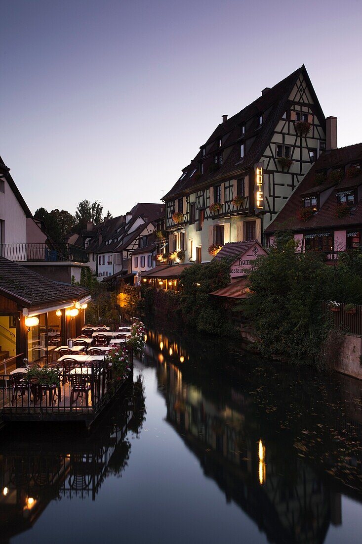 France, Haut-Rhin, Alsace Region, Alasatian Wine Route, Colmar, Petite Venise area by Lauch River, evening