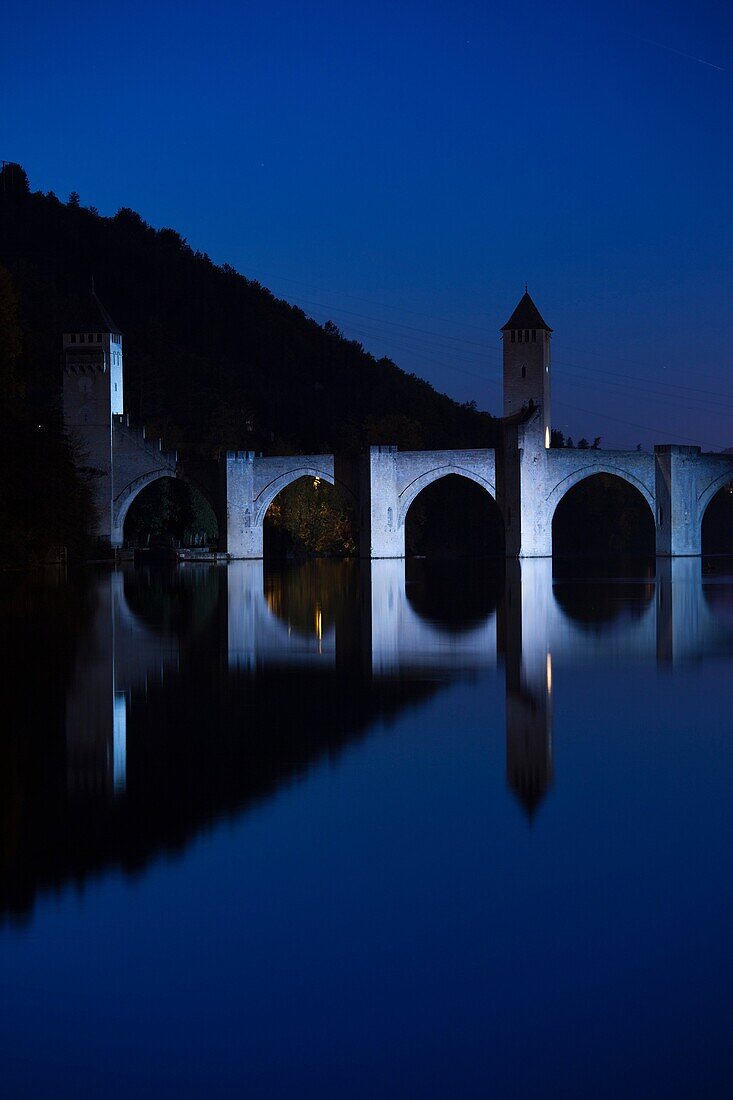 France, Midi-Pyrenees Region, Lot Department, Cahors, Pont Valentre, midieval bridge, Lot River, evening