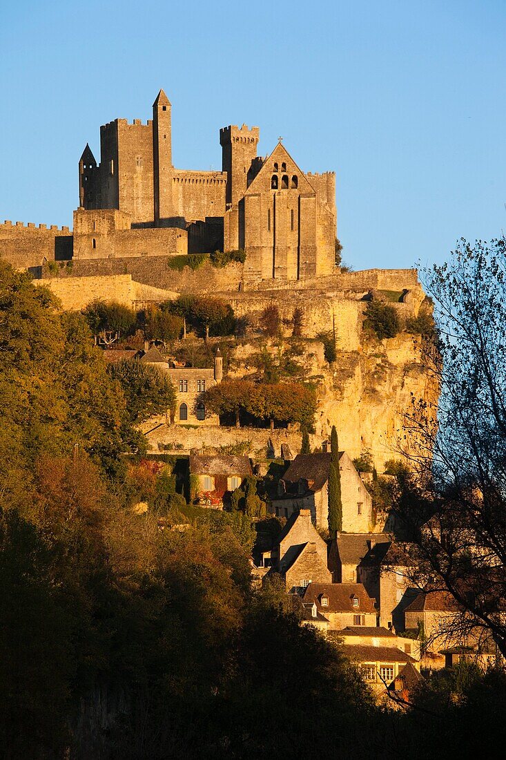 France, Aquitaine Region, Dordogne Department, Beynac-et-Cazenac, Chateau de Beynac, elevated view, sunset