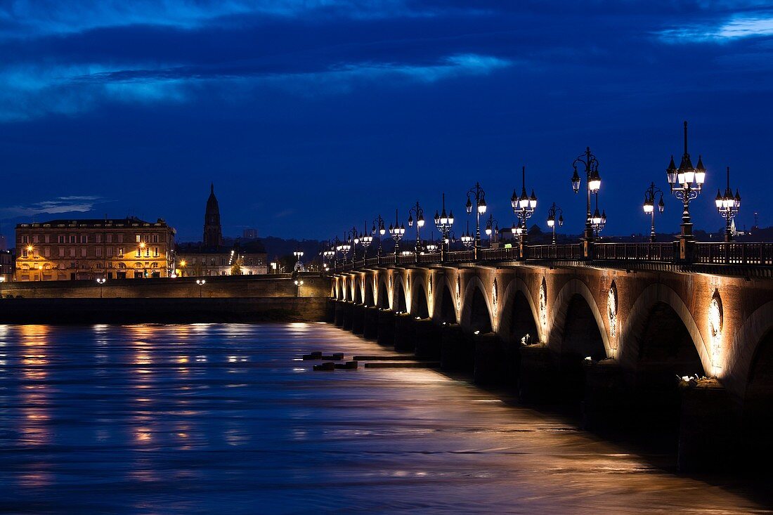 France, Aquitaine Region, Gironde Department, Bordeaux, Pont de Pierre bridge and Garonne River, dawn
