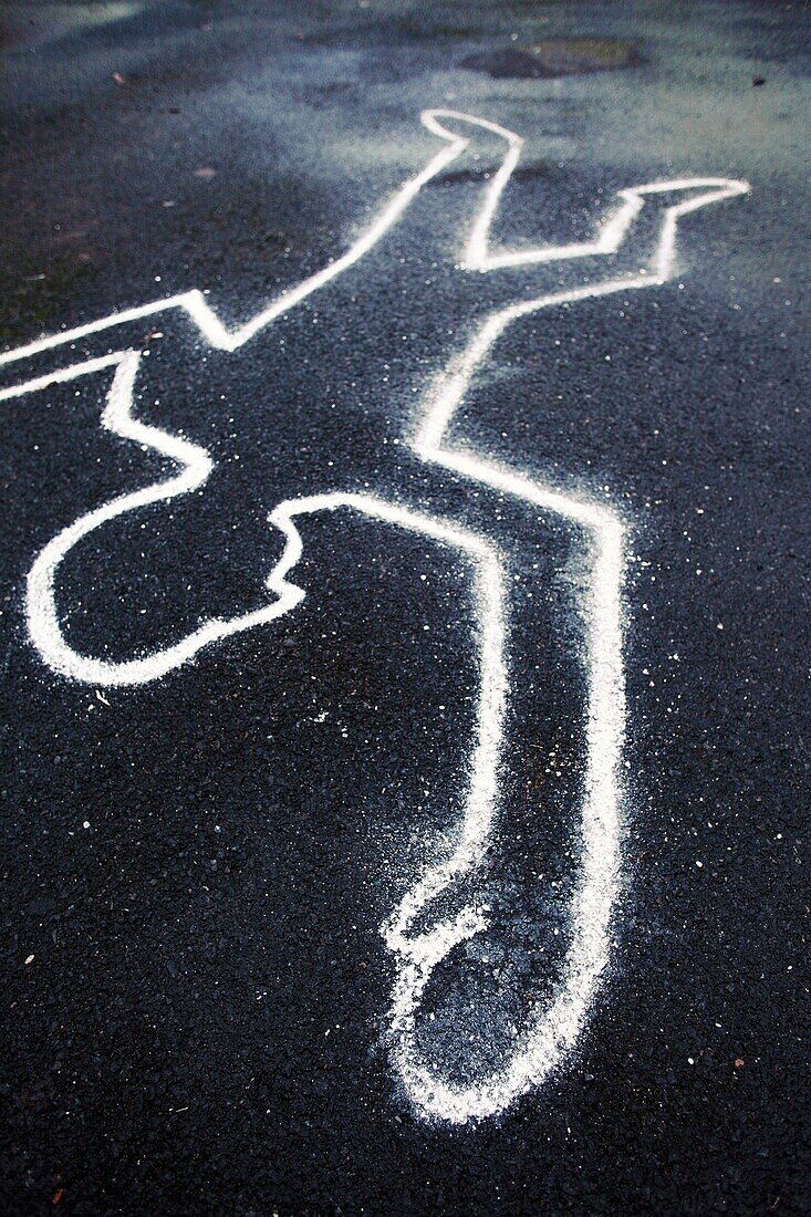 Chalk outline of body drawn on the floor as if at a crime scene