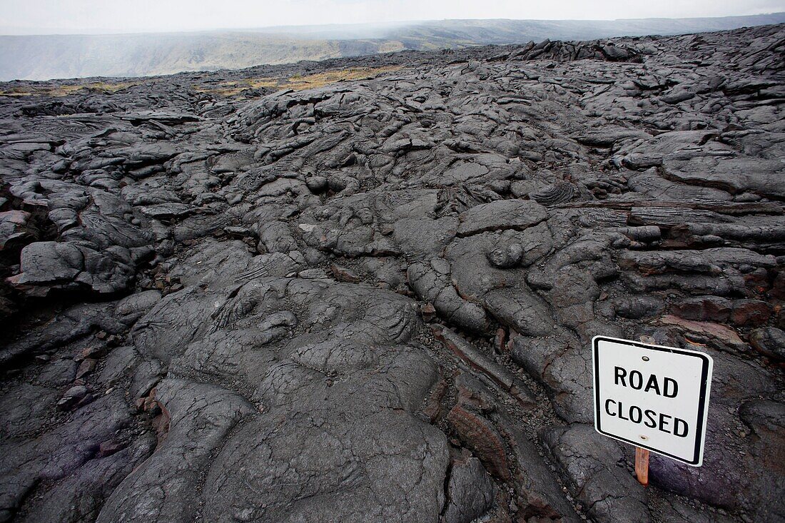 Lava from a 2003 lava flow covering the end of the Chain of Craters Road, Hawaii Volcanoes National Park, Hawaii, USA