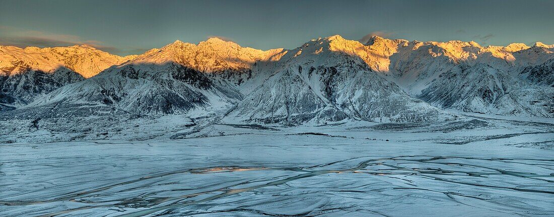 Dawn on Ben Ohau Range above snow covered Tasman River flats from Burnett Mountains, Canterbury