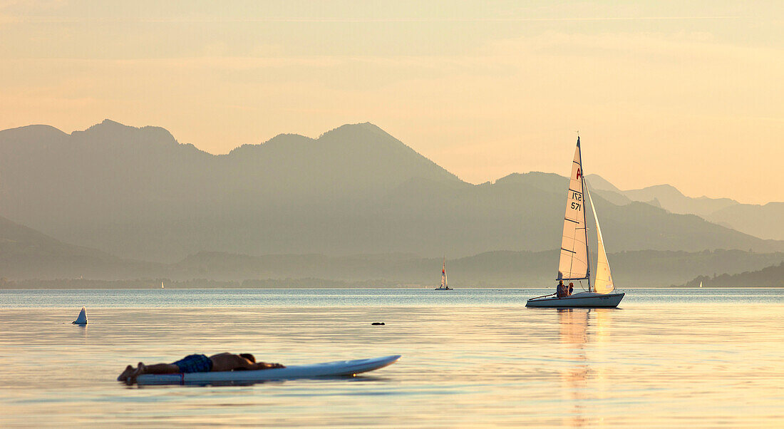 Sailboat on lake Chiemsee, Chiemgau, Upper Bavaria, Germany