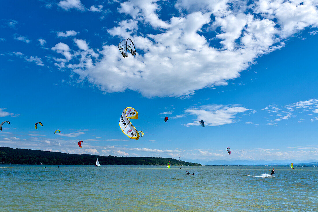 Kitesurfers in Bay of Herrsching, lake Ammersee, Upper Bavaria, Germany