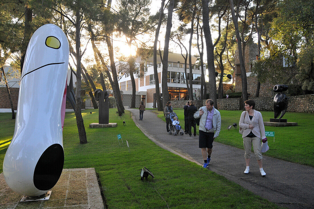 People at sculpture garden of the museum Fondation Maeght, Saint-Paul-de-Vence, Cote d'Azur, South France, Europe