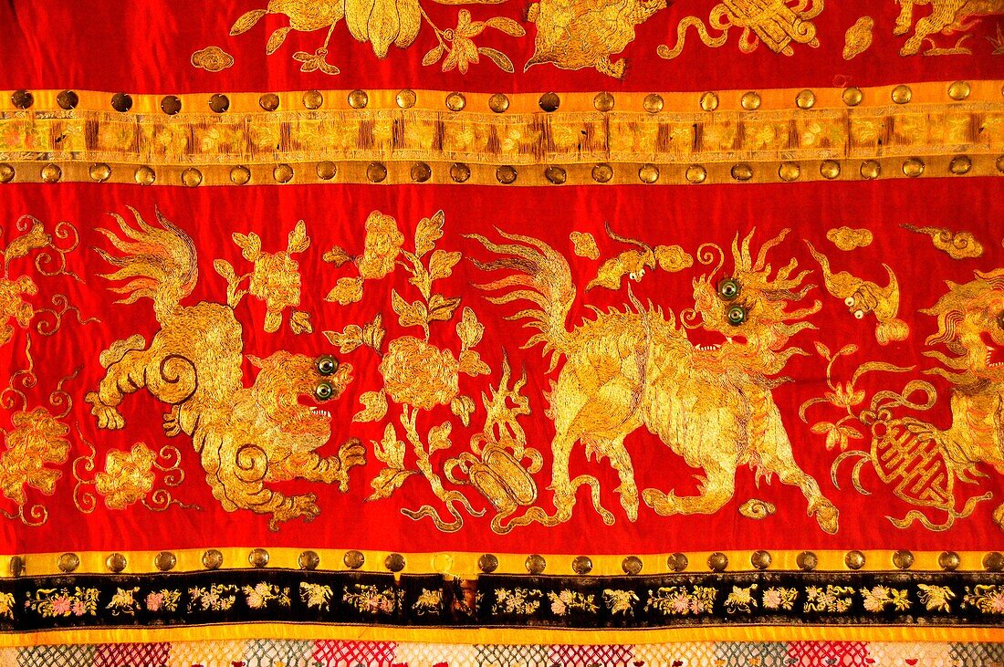 Asia- Vietnam- silk carpet in a bhudist temple