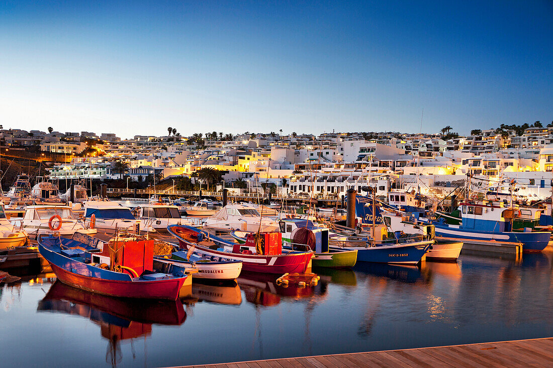 Illuminated harbour in the evening, Puerto del Carmen, Lanzarote, Canary Islands, Spain, Europe