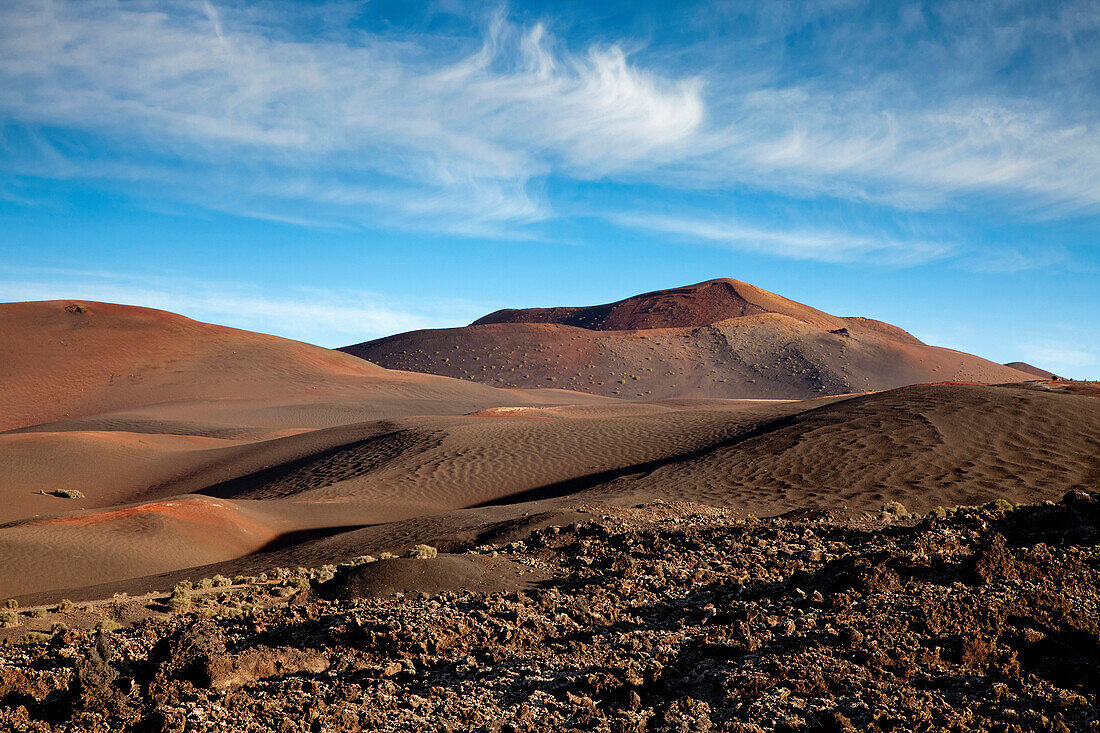 Volcanic landscape under clouded sky, Timanfaya National Park, Lanzarote, Canary Islands, Spain, Europe