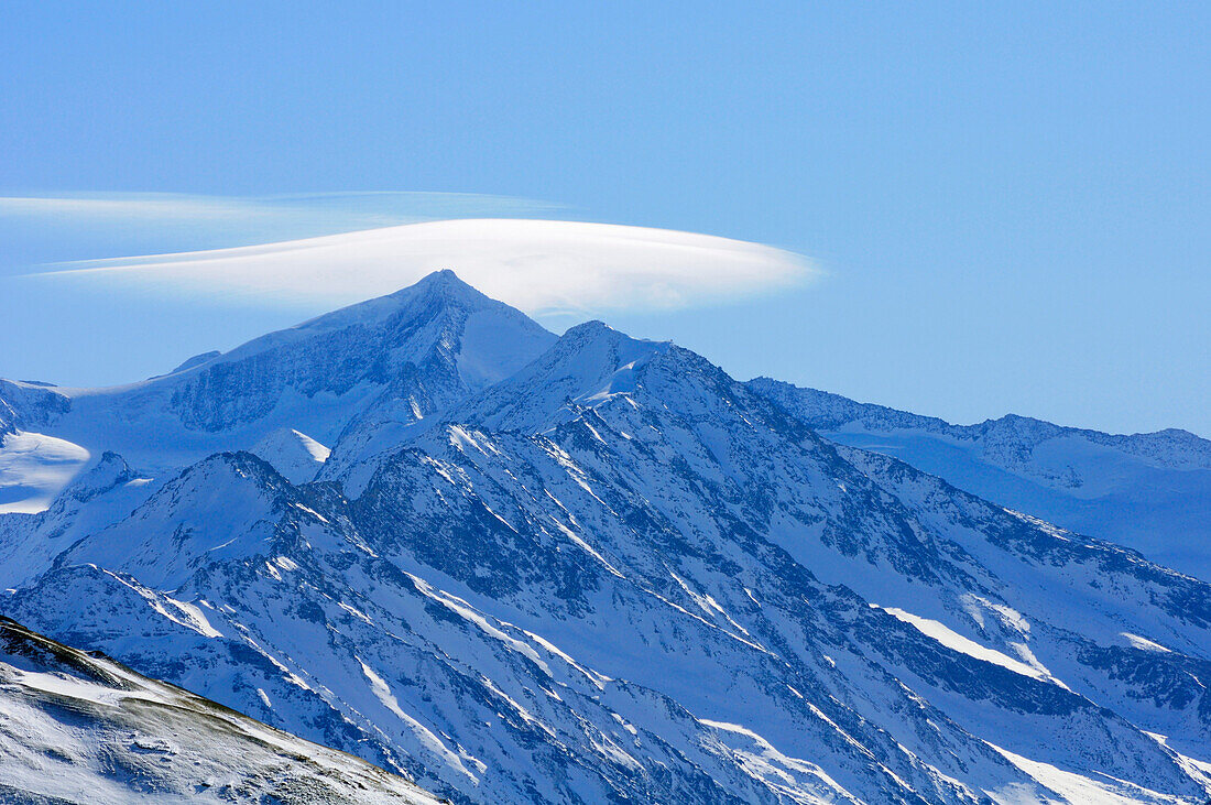 Foehn cloud in front of Grossvenediger, Skitour at Nadernachjoch, Neue Bamberger hut, Kitzbuehel Alps, Tyrol, Austria
