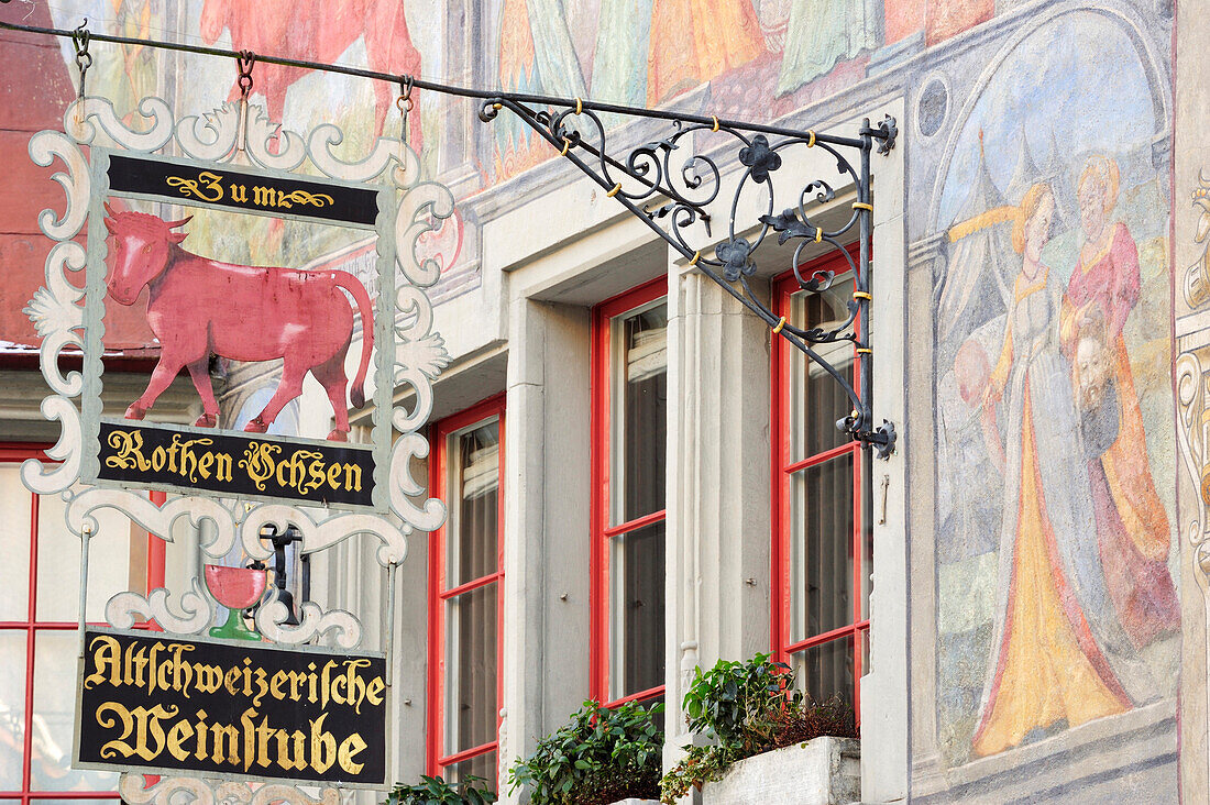 Painted fassade of building with old-fashioned sign at the marketplace in Stein am Rhein, Stein am Rhein, Switzerland