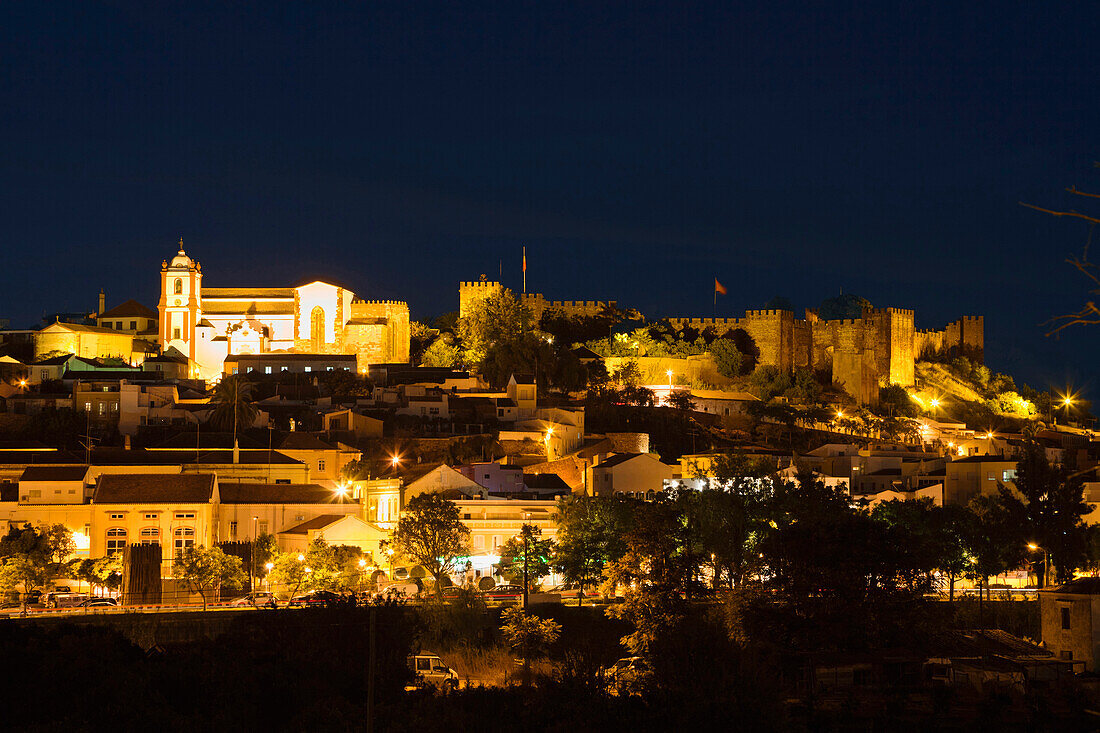 Skyline of Silves with castle and Cathedral by night, Algarve, Portugal, Europe