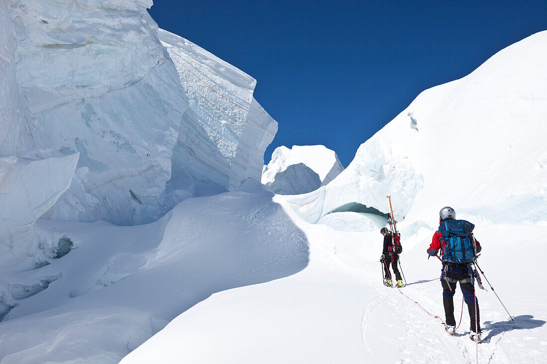 Ski mountaineers in a crevasse, Mont Blanc du Tacul, Chamonix, Mont-Blanc, France