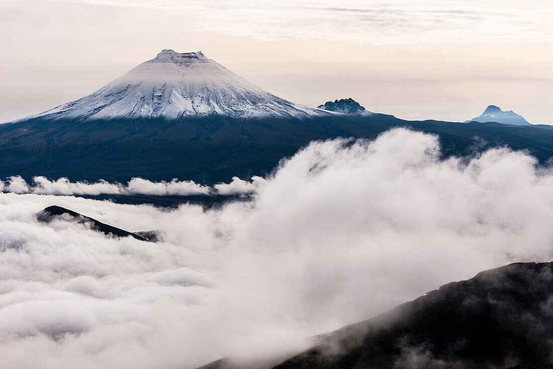 Volcano Cotopaxi above clouds, seen from Los Illinizas, Ecuador, South America