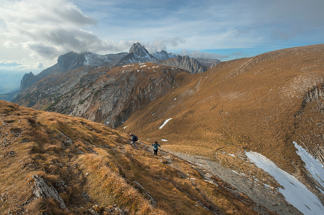 Hikers in the Alpstein mountain range, St. Gallen, Switzerland, Europe