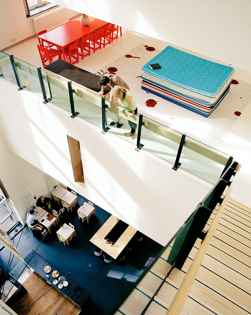 View from one of the platforms into the open restaurant area, Lloyd Hotel, Zeeburg, Amsterdam, Netherlands