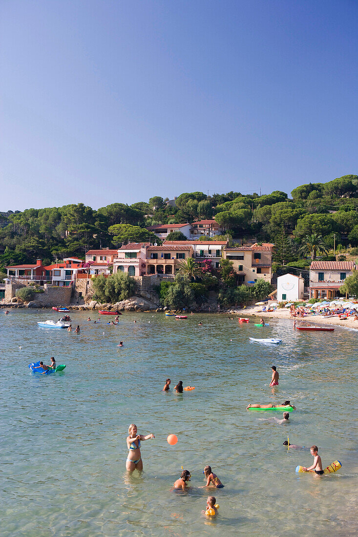 People bathing in a bay at Biodola, Elba, Tuscany, Italy, Europe