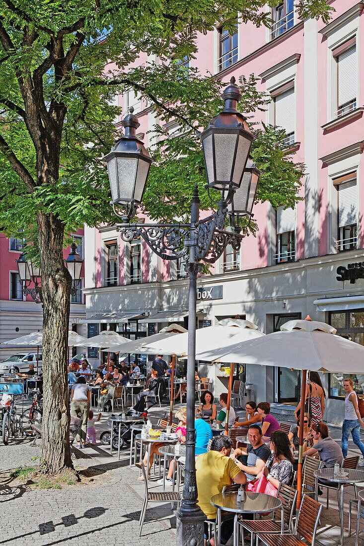 People at Box Cafe and restaurant at Gaertnerplatz, a popular square in Munich, Upper Bavaria, Bavaria, Germany, Europe