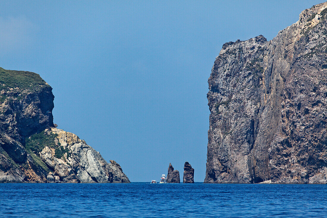 Rocky coast in the sunlight, Faraglioni Lucia Rosa, Island of Ponza, Pontine Islands, Lazio, Italy, Europe