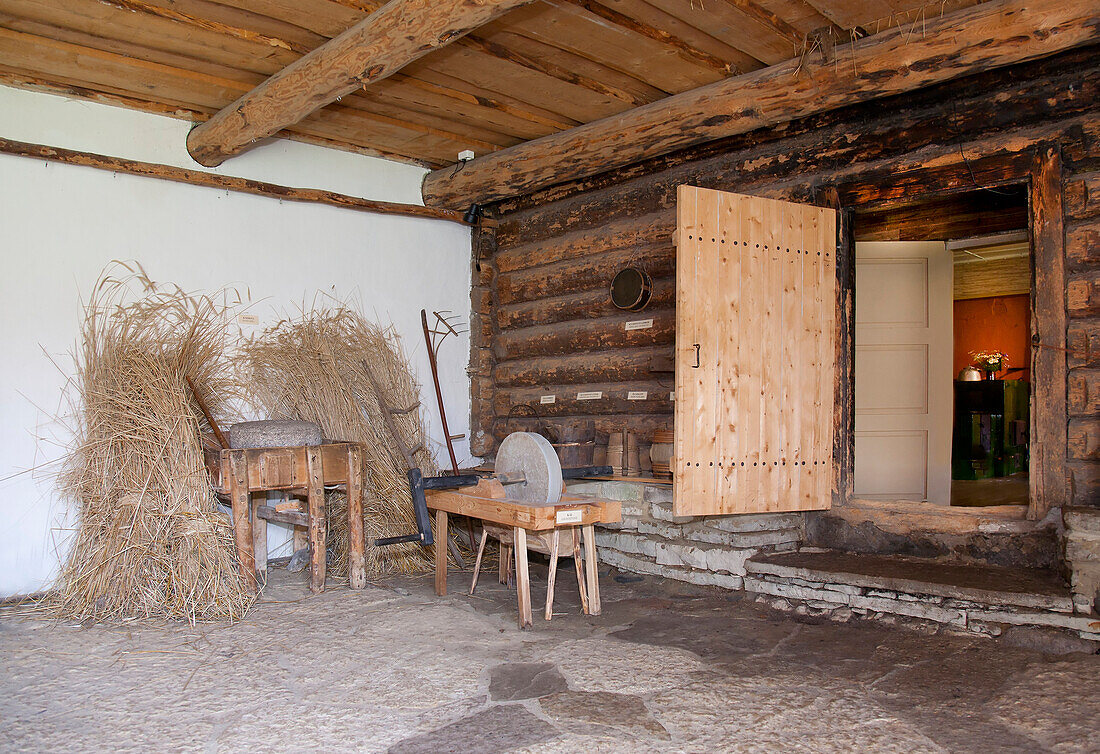 Old Fashioned Cabin Front With a Sharpening Stone, Estonia