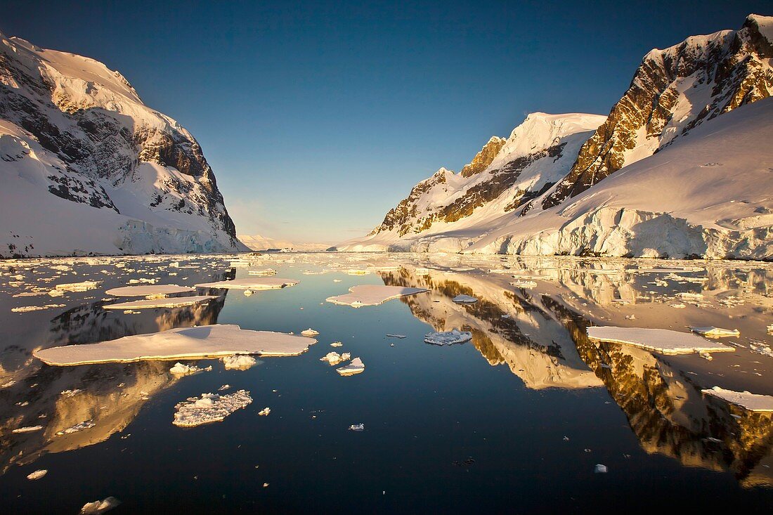 Lemaire Channel reflection at sunset, Antarctic Peninsula.