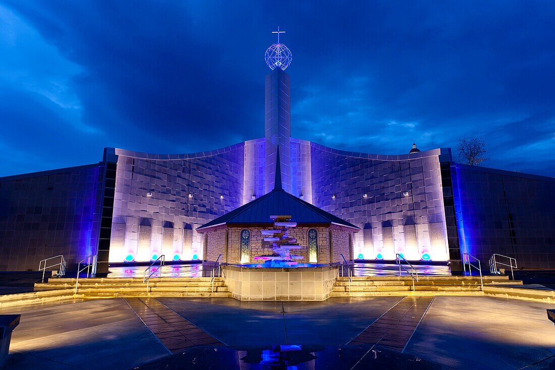 The shrine of the Holy Spirit illuminated at night in Branson, Missouri, USA