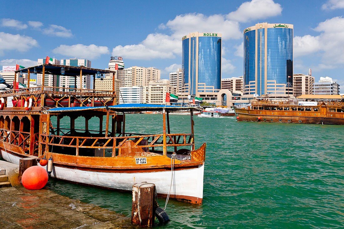 Rustic riverboats on Dubai Creek in Dubai, UAE, Persian Gulf.
